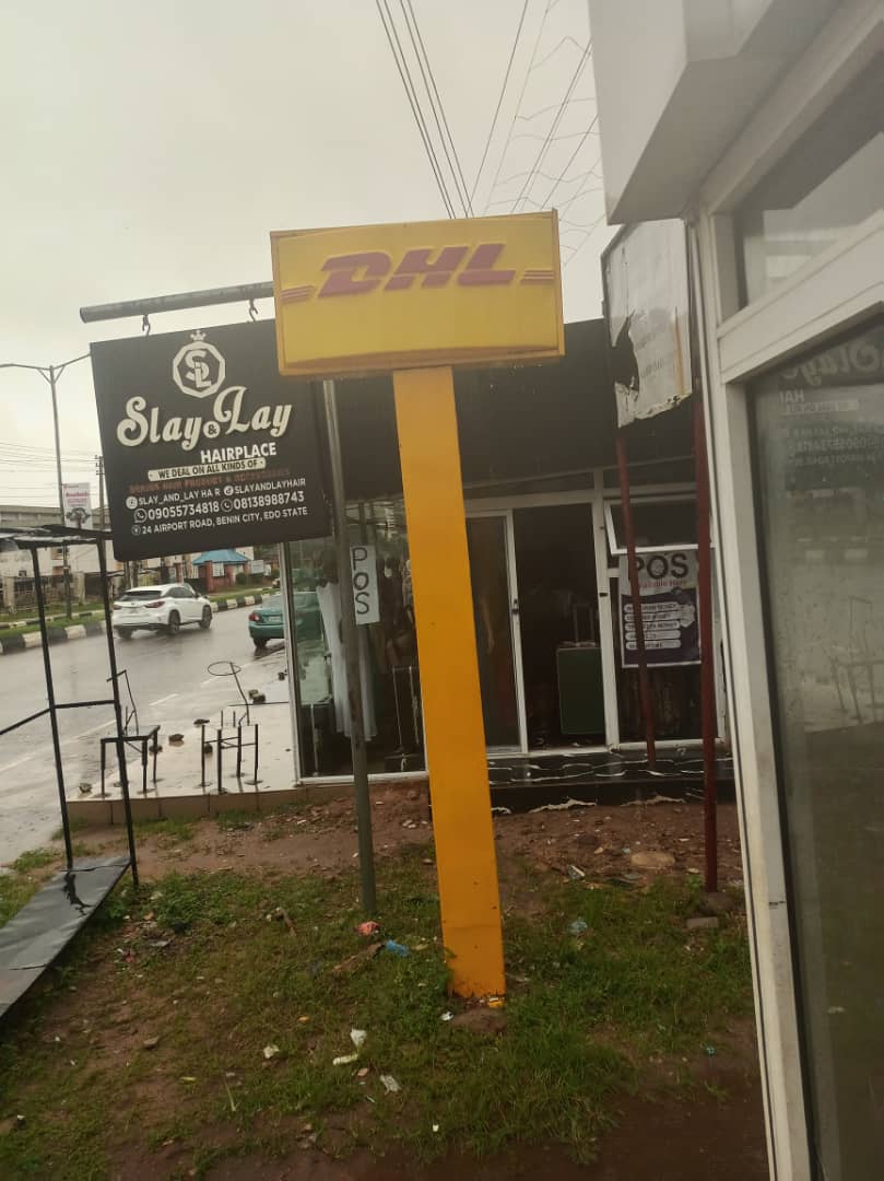 DHL service point signage at No 24 Airport Road, Benin City